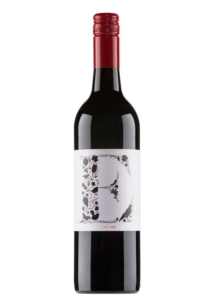 A bottle of E Series Shiraz with a white label and red cap.